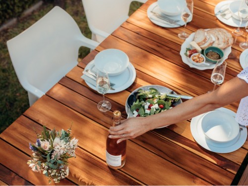 woman-setting-a-dining-table-for-housewarming-picture